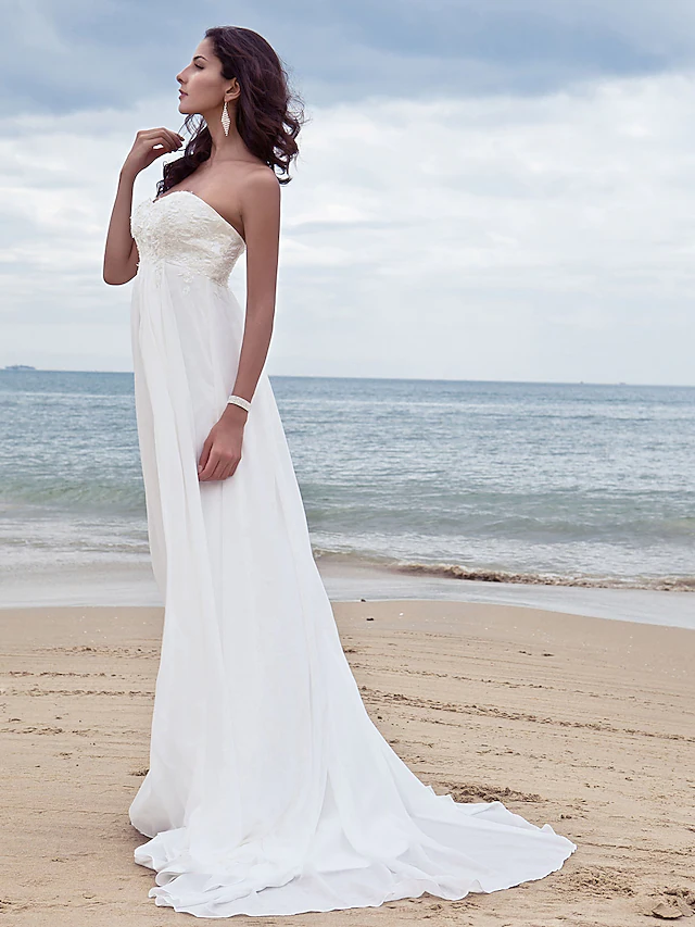 Side profile of the A-Line sweetheart strapless wedding dress.