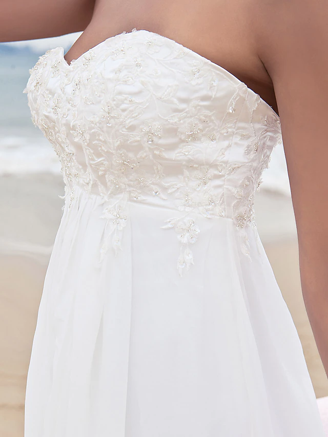 Back view of the chiffon wedding dress showing the court train.