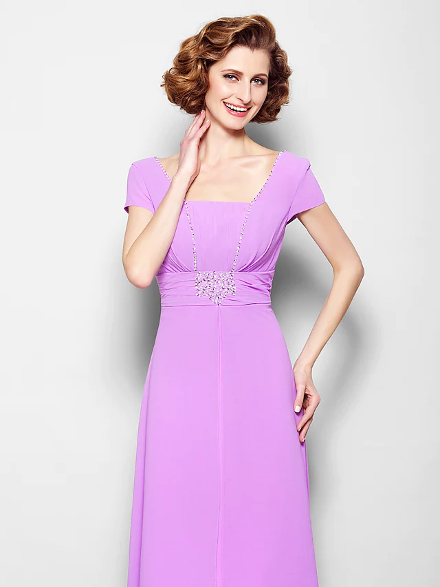 Full-length view of the A-line dress, highlighting its elegant drape and floor-length design.