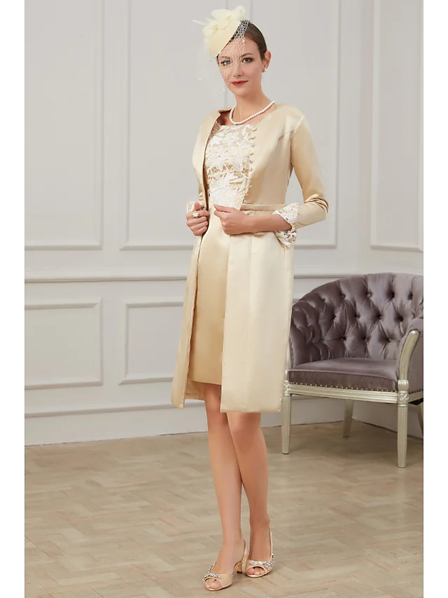 Back view of the knee-length Mother of the Bride dress, showcasing its silhouette.