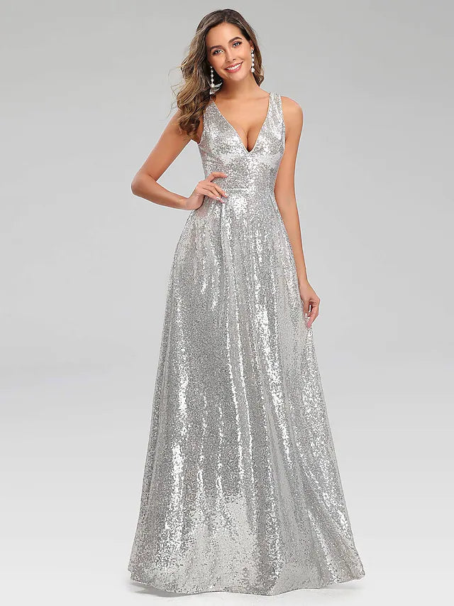 Model wearing a sparkling A-line V-neck sequin prom dress, front view.