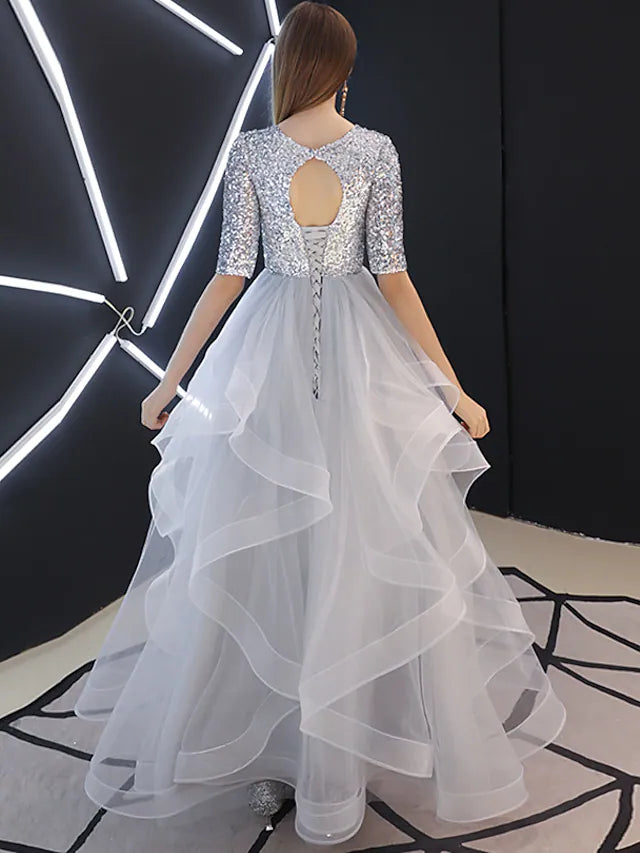 Close-up of the sequin and tulle fabric on the elegant bridesmaid dress.