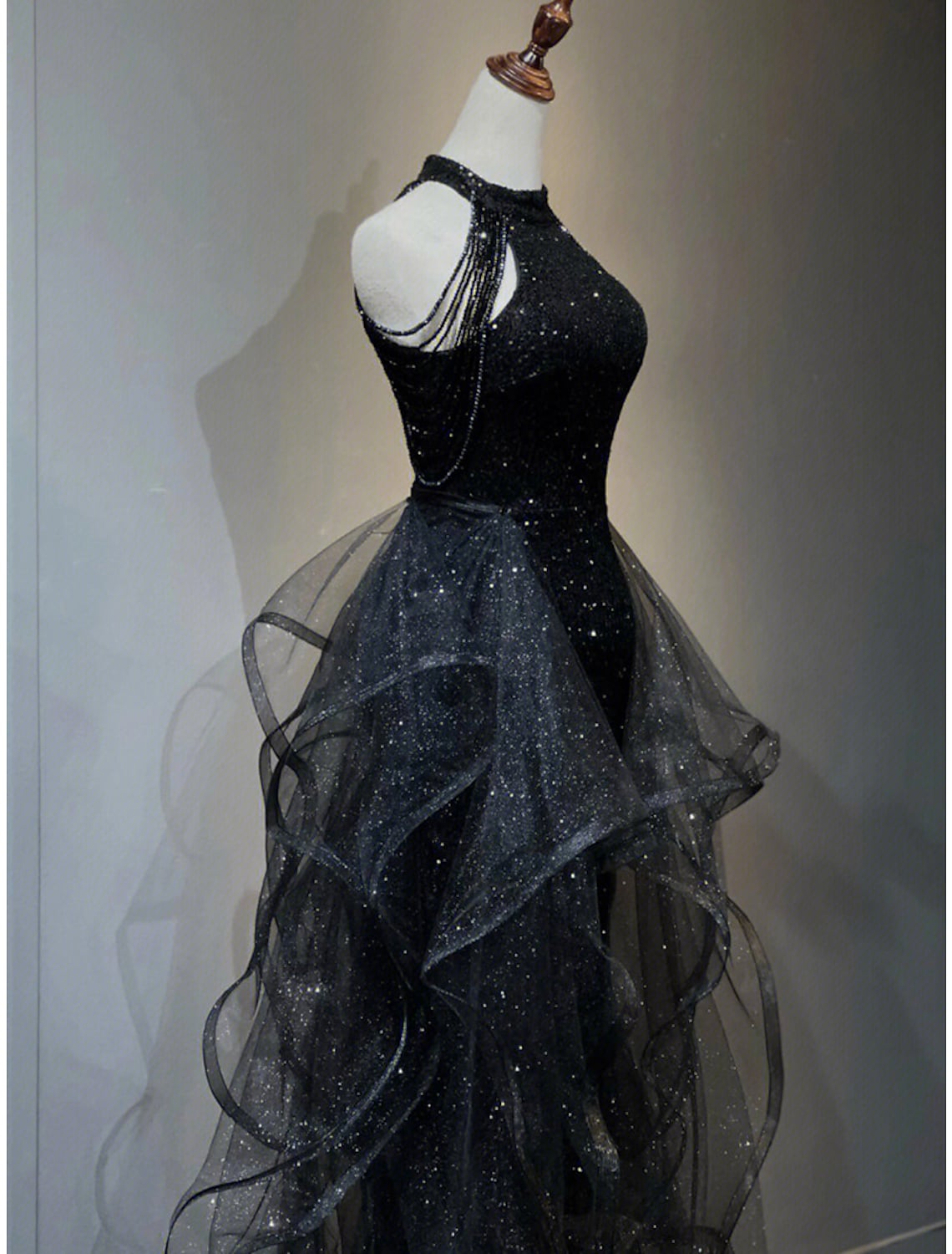 Close-up of the sequin and crystal embellishments on the prom dress.