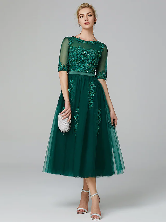 Sparkling A-line formal dress with illusion neck and sequin lace.