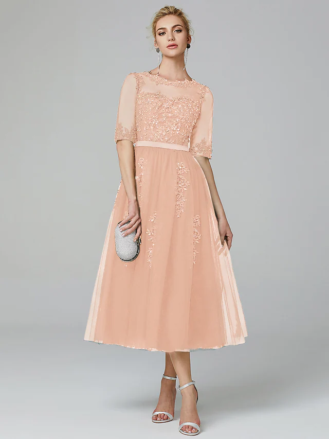 Side view of the sparkling wedding guest dress.