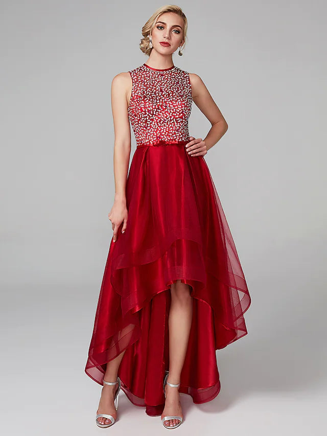 Elegant A-line sequin satin dress with asymmetrical hem and jewel neck.