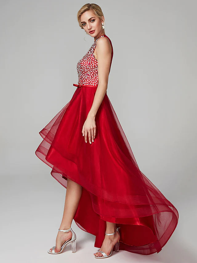 Side view of sparkling A-line formal gown with sequin details.