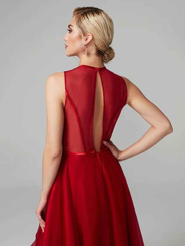Close-up of the sequin and satin fabric on the A-line dress.