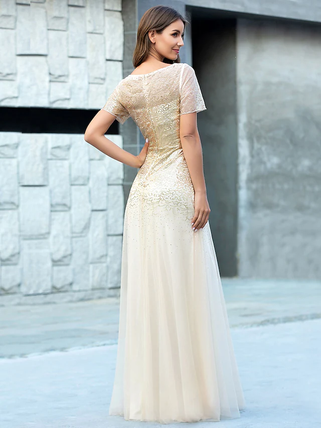 Back view of A-Line floor length sequin tulle gown.