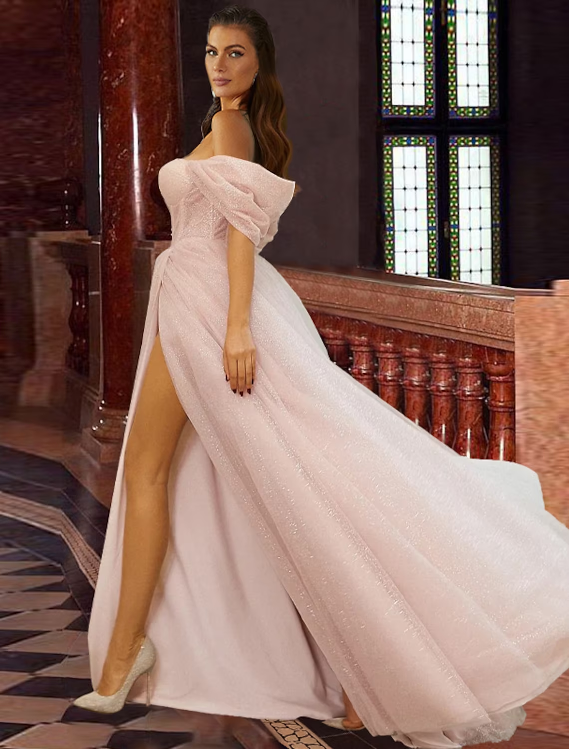 Side view of A-Line prom dress showing sweep train and pleats.