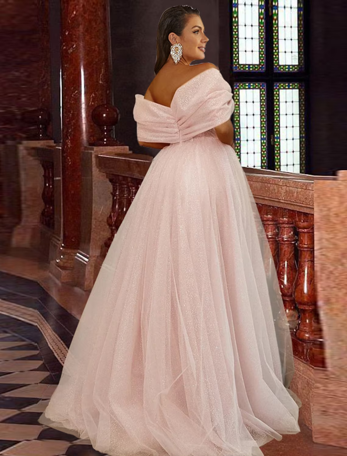 Back view of off-shoulder glitter tulle prom dress.