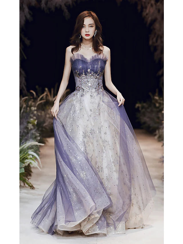 Close-up of the sparkling A-line strapless satin formal dress.
