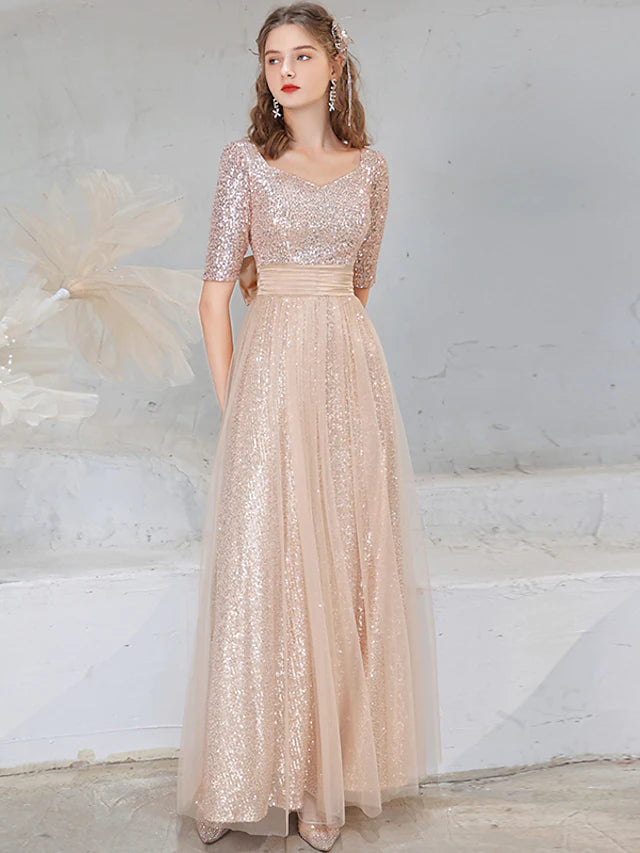 Sparkling A-line V-neck sequined evening gown with half sleeves and a bow detail.
