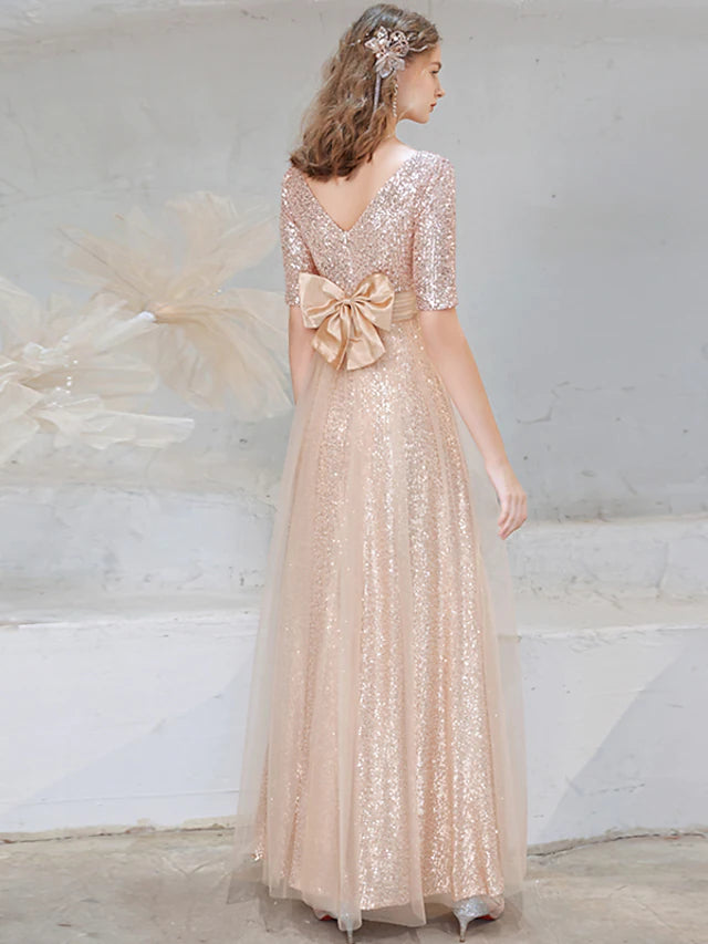 Side view of the half-sleeve A-line sequined gown, perfect for formal occasions.