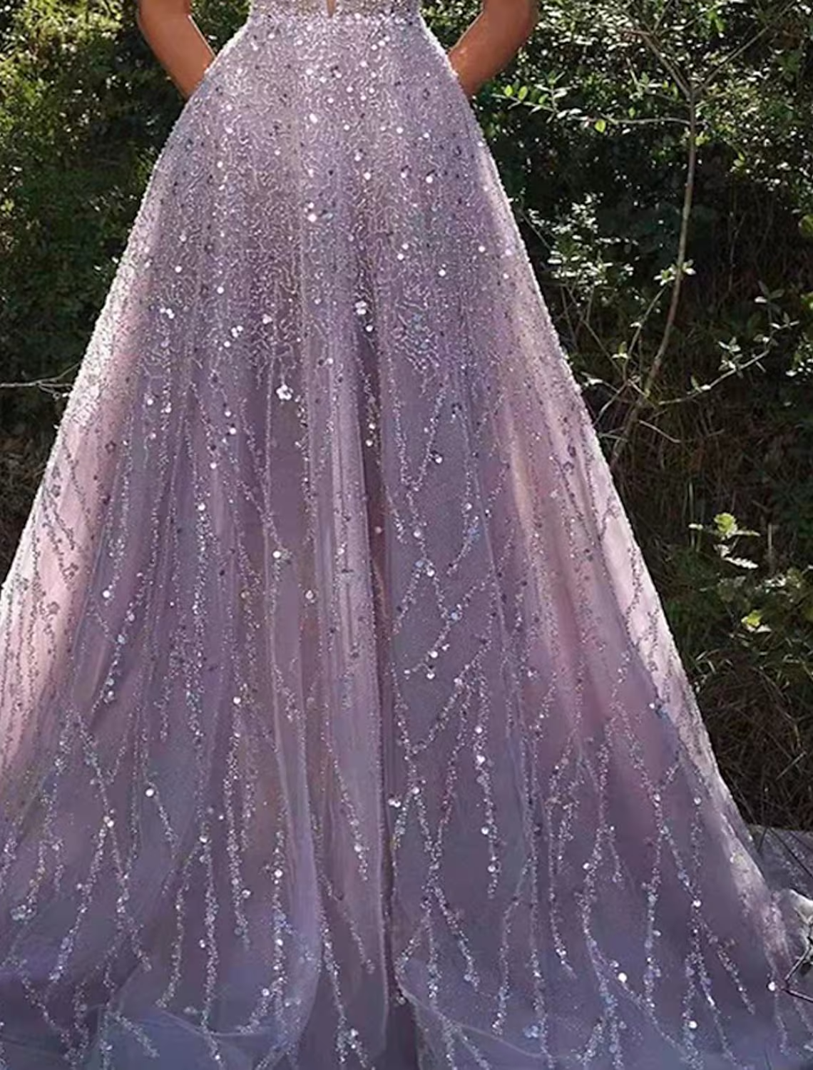 Close-up of sequin detail on the A-line prom dress.