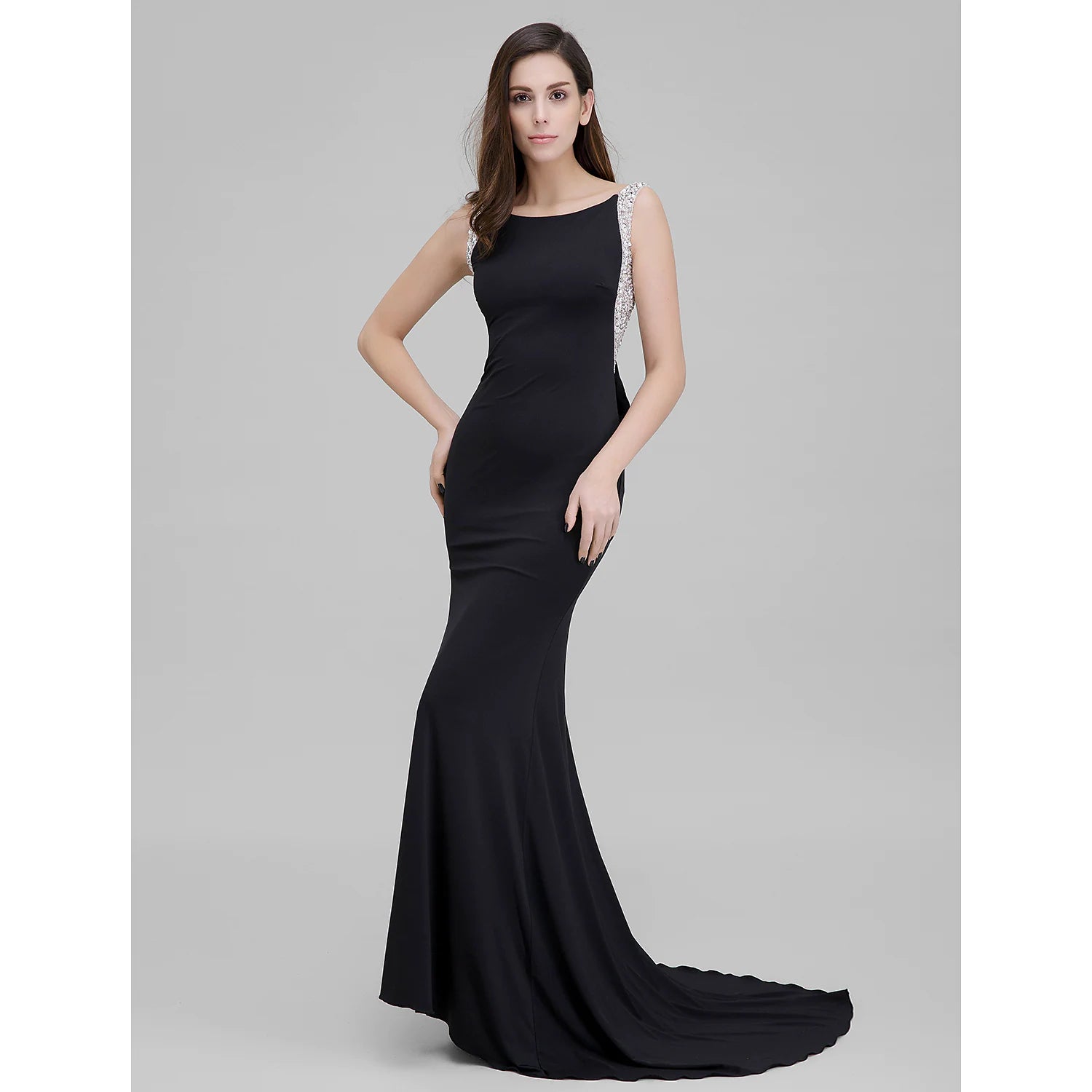 Sparkling mermaid trumpet formal evening dress with scoop neck and court train.