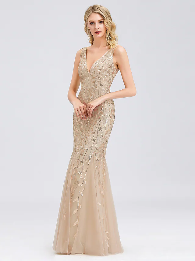 Side profile of the elegant tulle prom gown.