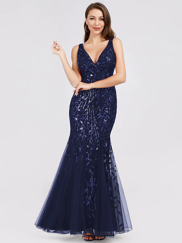 Close-up of sequin and applique details on the evening dress.