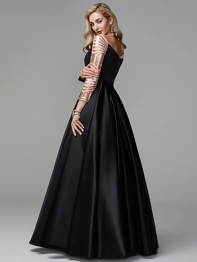 Elegant off-shoulder long sleeve ball gown for formal occasions.