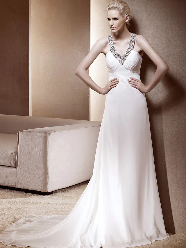 Front view of a sparkling Princess A-Line V-neck sleeveless wedding dress with a court train.