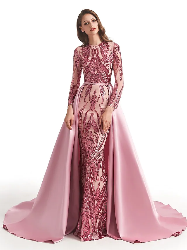 Back view of sparkling ball gown featuring a detachable overskirt.