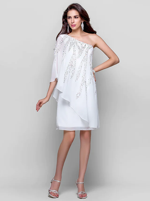 Sparkling white one-shoulder cocktail dress with sequin details.