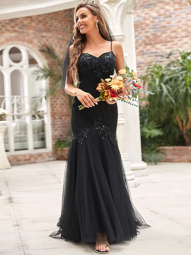 Back view of the elegant mermaid wedding gown, showing the train.