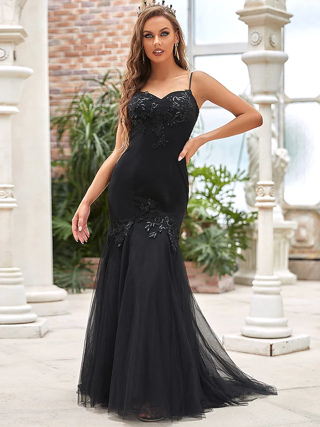 Side view of the V-neck sequined wedding dress, highlighting the silhouette.