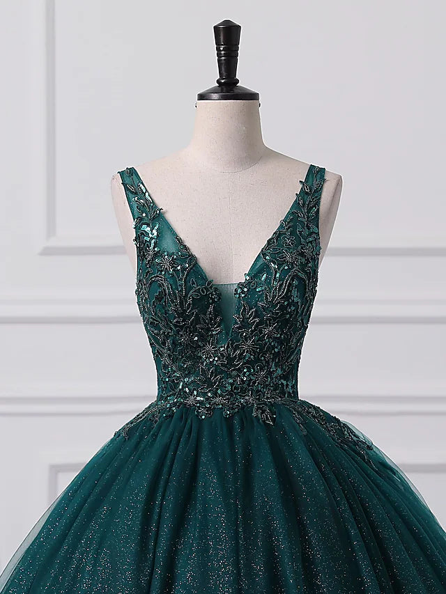 Back view of a woman wearing a sleeveless, floor-length prom dress.