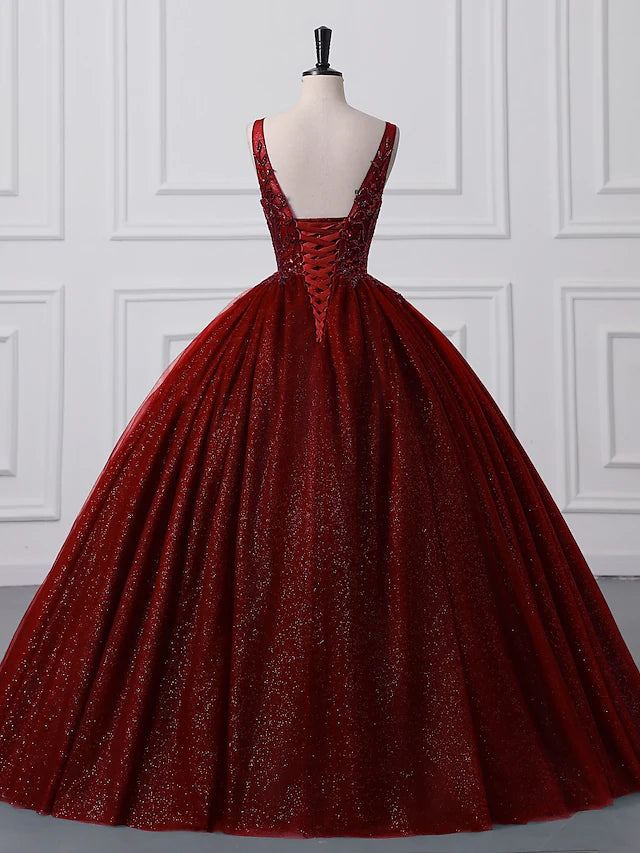 Woman gracefully walking in a floor-length quinceanera ball gown.