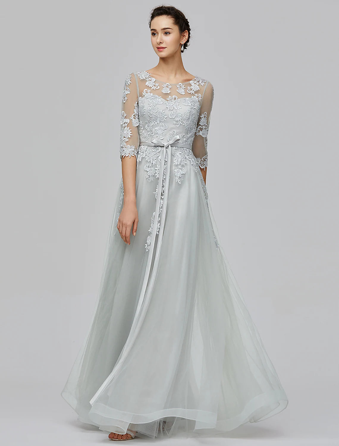 Back view of the A-Line Empire dress showcasing delicate bow appliques.