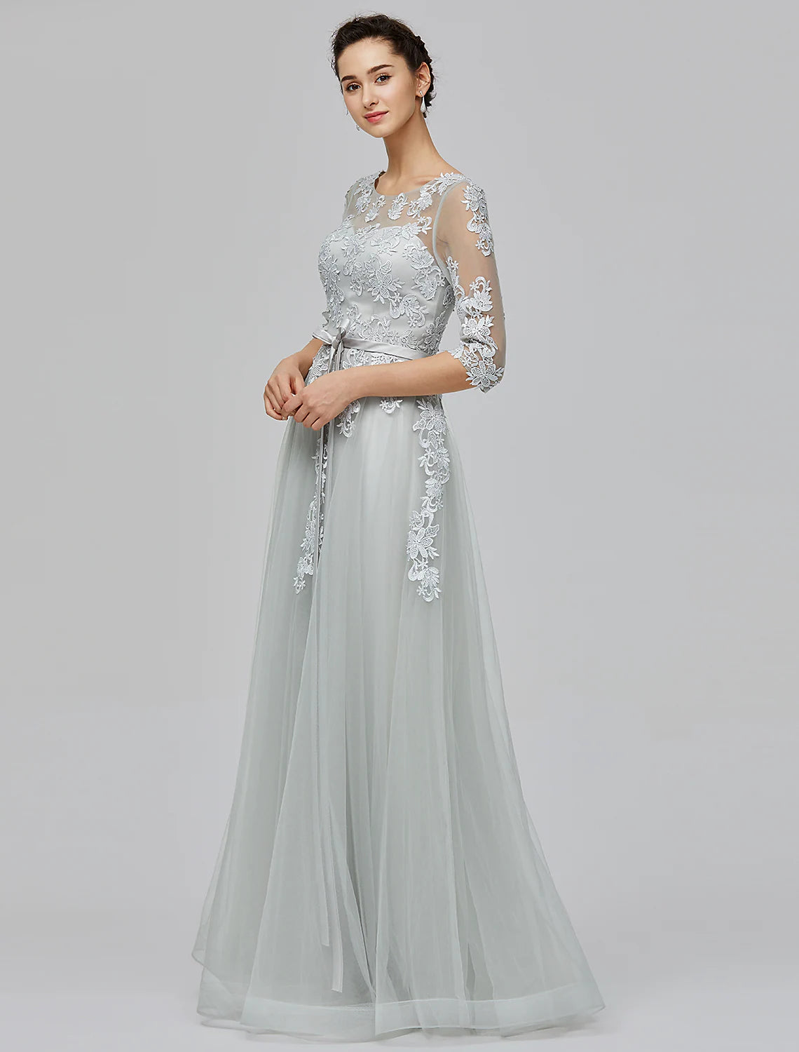 Side profile of the elegant Tulle wedding guest dress.