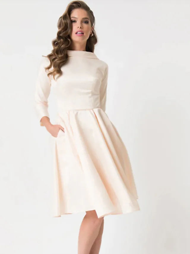 Front view of a white A-line wedding dress with a jewel neck and 3/4 sleeves, featuring elegant draping.
