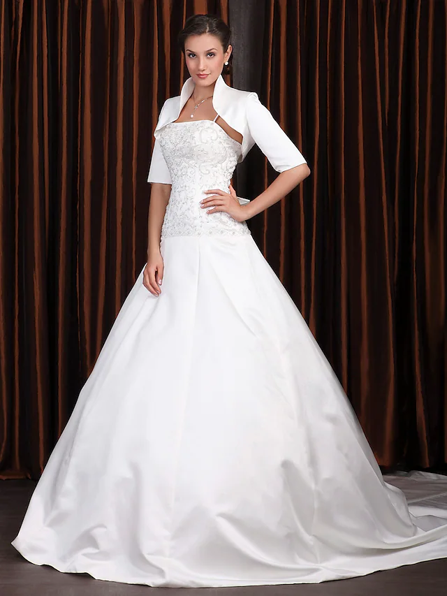 Elegant A-Line wedding dress with square neck, half sleeves, and cathedral train.