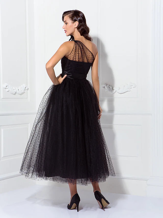 Model wearing the vintage A-Line cocktail dress at an event.
