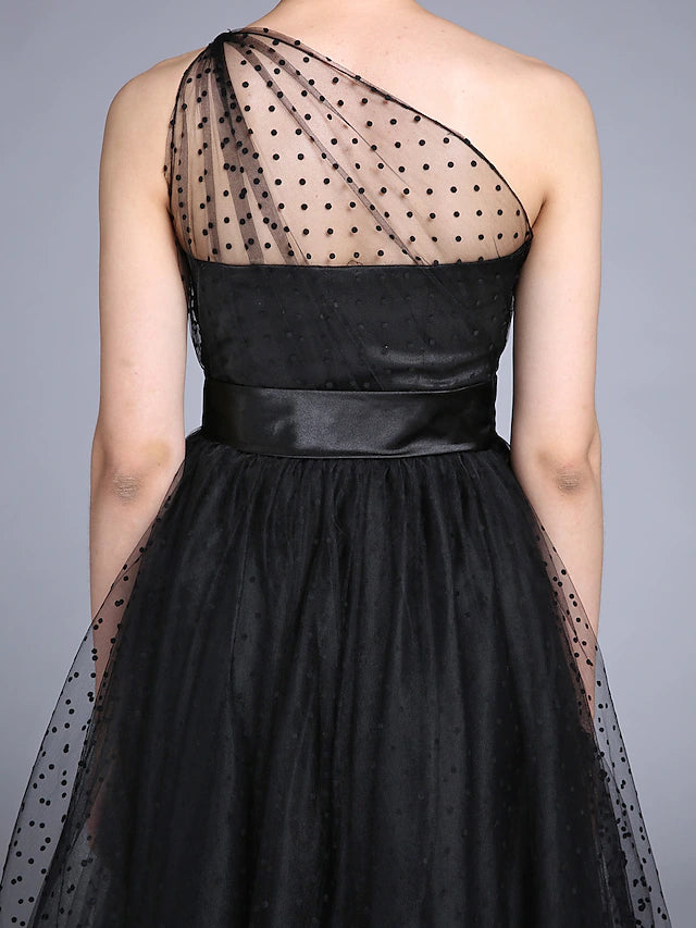 Side profile of the one-shoulder ankle-length formal dress.