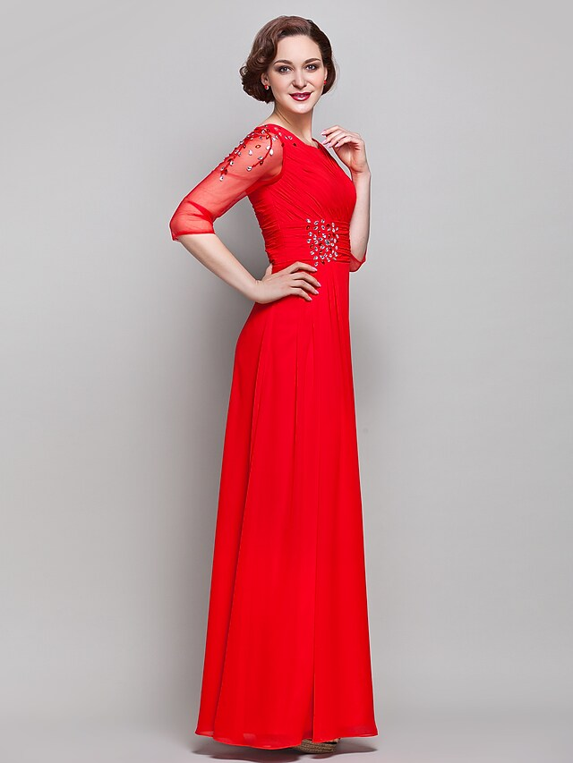 Close-up of square neckline and 3/4 length sleeve on the dress.