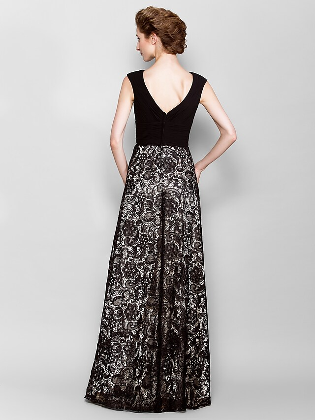 Side profile of the sleeveless floor-length Mother of the Bride gown.